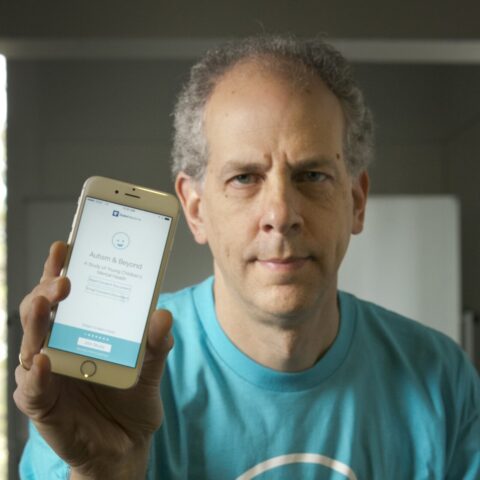 Guillermo Sapiro showing the Autism & Beyond app