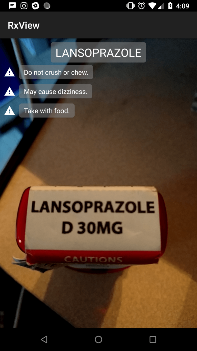 Android app displaying information about a medication overlaid on the medication bottle being seen through a camera